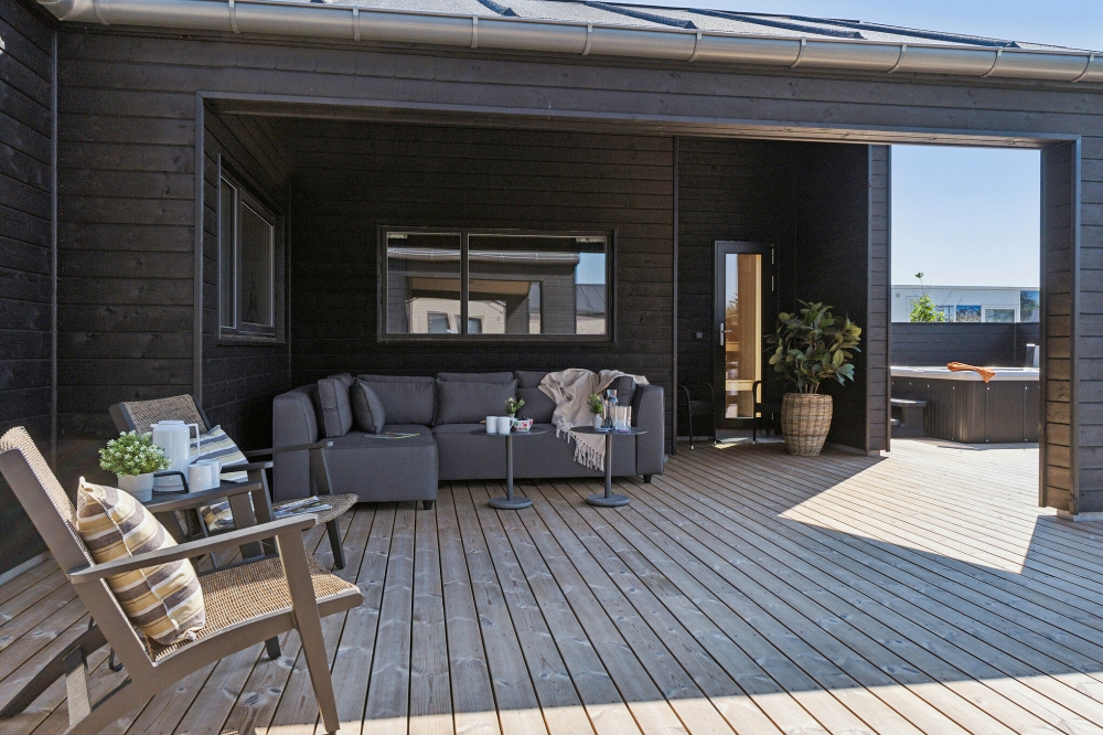 Das Luxusferienhaus Nr. 634 hat eine tolle Terrasse, die mit hochwertigen Gartenmöbeln für 18 Personen ausgestattet ist.