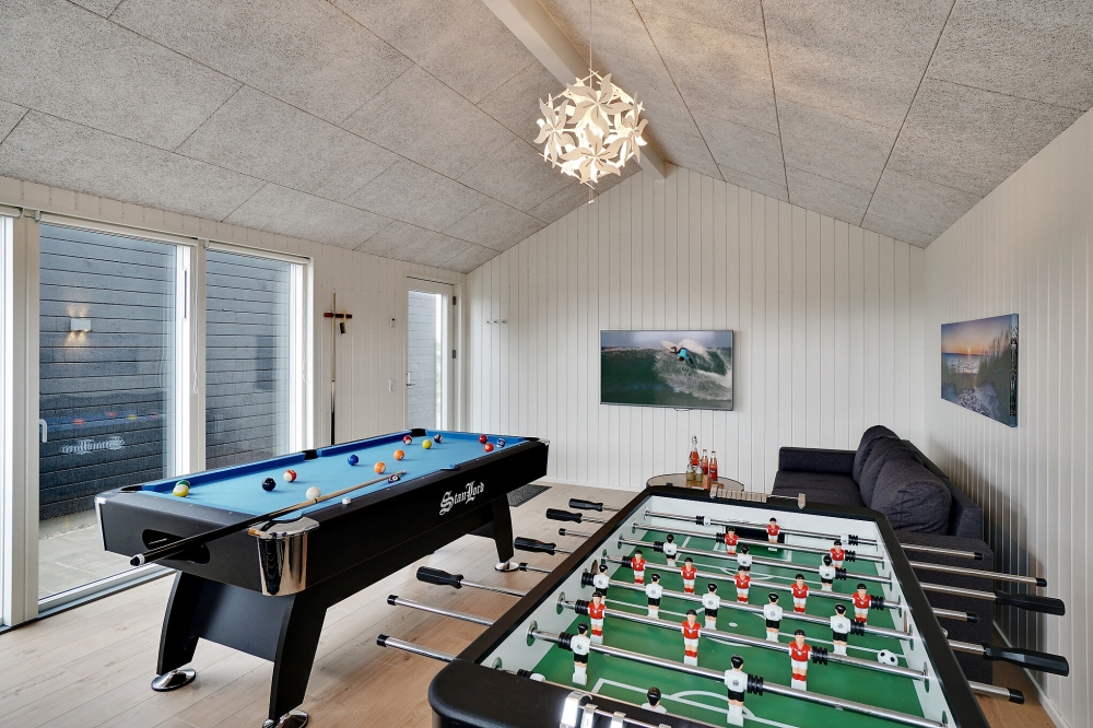 Neben den vielen schönen Stunden, die man im Poolbereich des Hauses verbringen kann, bietet das Luxusferienhaus 636 auch Spielevergnügen bei Billard/Tischtennis und Darts