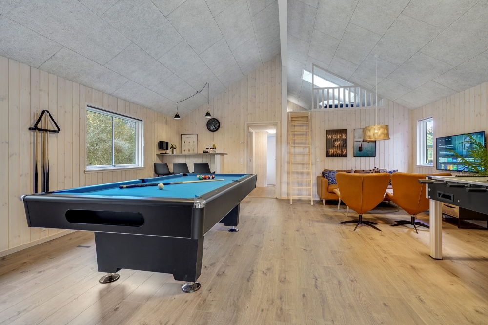 Neben den vielen schönen Stunden, die man im Poolbereich des Hauses verbringen kann, bietet das Luxusferienhaus 638 auch Spielevergnügen bei Billard/Tischtennis und Darts