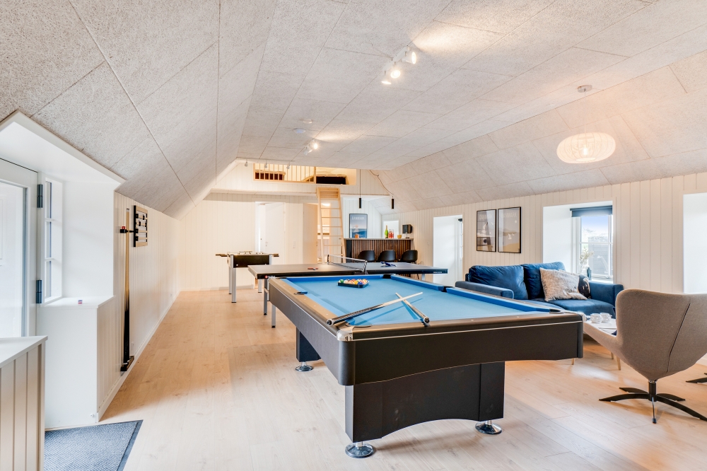 Neben den vielen schönen Stunden, die man im Poolbereich des Hauses verbringen kann, bietet das Luxusferienhaus 645 auch Spielevergnügen bei Billard/Tischtennis und Darts