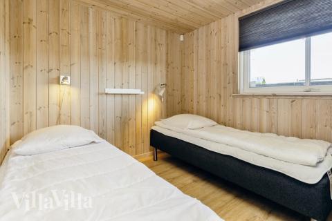 Eines der 8 Schlafzimmer im Luxusferienhaus Nr. 267