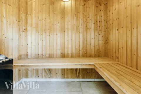 Genießen Sie die heiße Sauna im Luxusferienhaus Nr. 267 für 20 Personen