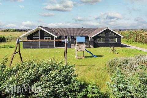 Dieses schicke Poolhaus Nr. 267 liegt in Nordjütland und bietet Platz für 20 Personen.