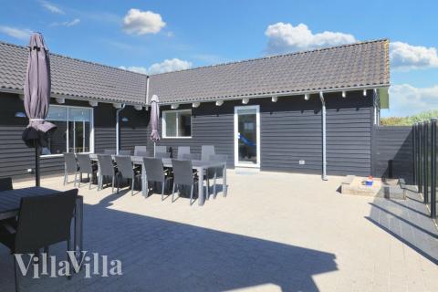 Genießen Sie einen Grillabend auf der Terrasse des Luxusferienhauses Nr. 267 in Nordjütland