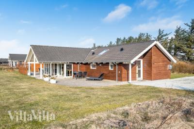 Dieses schöne Poolhaus Nr. 236 mit Platz für 14 Personen liegt in Nordjütland
