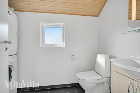 Eines der Badezimmer im Luxusferienhaus Nr. 236