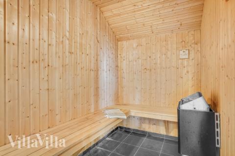 Genießen Sie die heiße Sauna im Luxusferienhaus Nr. 236 für 14 Personen