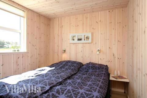 Eines der 9 Schlafzimmer im Luxusferienhaus Nr. 192