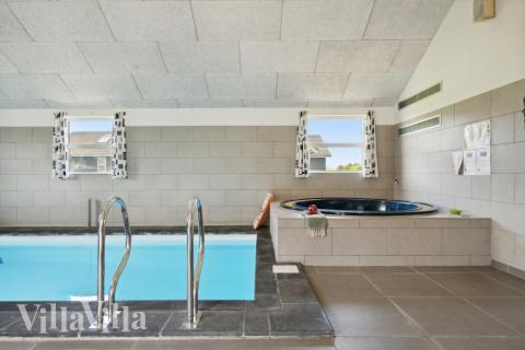 Genießen Sie den warmen Whirlpool im Luxusferienhaus Nr. 192 in Nordjütland