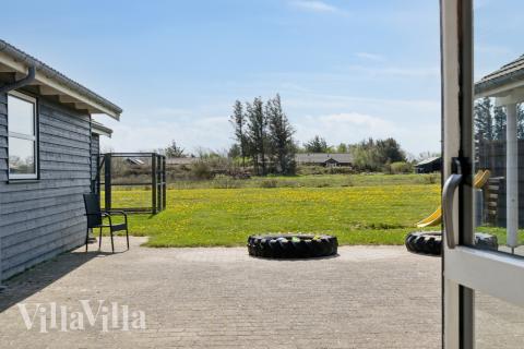 Genießen Sie einen Grillabend auf der Terrasse des Luxusferienhauses Nr. 192 in Nordjütland
