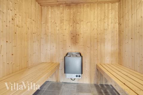 Genießen Sie die heiße Sauna im Luxusferienhaus Nr. 194 für 20 Personen