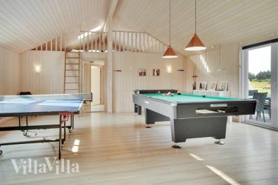 Neben den vielen schönen Stunden, die man im Poolbereich des Hauses verbringen kann, bietet das Luxusferienhaus 194 auch Spielevergnügen bei Billard/Tischtennis und Darts
