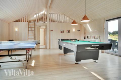 Neben den vielen schönen Stunden, die man im Poolbereich des Hauses verbringen kann, bietet das Luxusferienhaus 194 auch Spielevergnügen bei Billard/Tischtennis und Darts