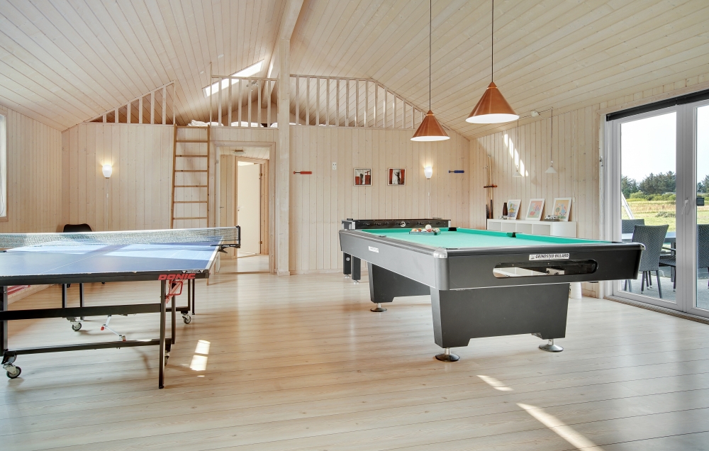 Neben den vielen schönen Stunden, die man im Poolbereich des Hauses verbringen kann, bietet das Luxusferienhaus 194 auch Spielevergnügen bei Billard/Tischtennis und Darts