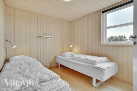 Eines der 8 Schlafzimmer im Luxusferienhaus Nr. 194