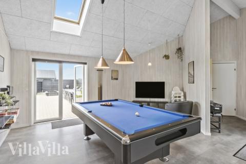 Neben den vielen schönen Stunden, die man im Poolbereich des Hauses verbringen kann, bietet das Luxusferienhaus 193 auch Spielevergnügen bei Billard/Tischtennis und Darts