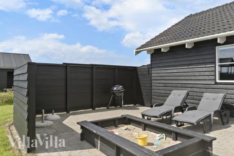 Genießen Sie einen Grillabend auf der Terrasse des Luxusferienhauses Nr. 193 in Nordjütland