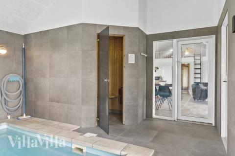 Genießen Sie die heiße Sauna im Luxusferienhaus Nr. 193 für 16 Personen