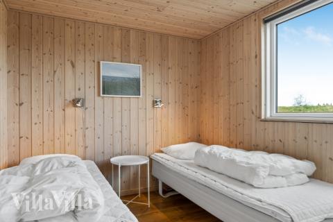 Eines der 7 Schlafzimmer im Luxusferienhaus Nr. 304