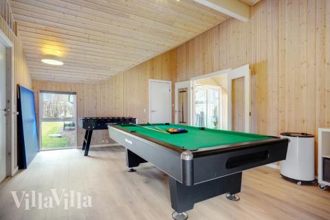 Aktivitätsraum im Luxusferienhaus Nr. 264 mit 5 Schlafzimmern und Platz für 14 Gäste.