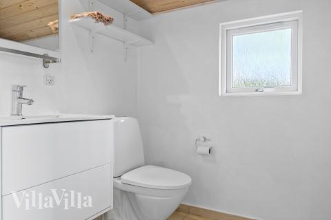 Eines der Badezimmer im Luxusferienhaus Nr. 264