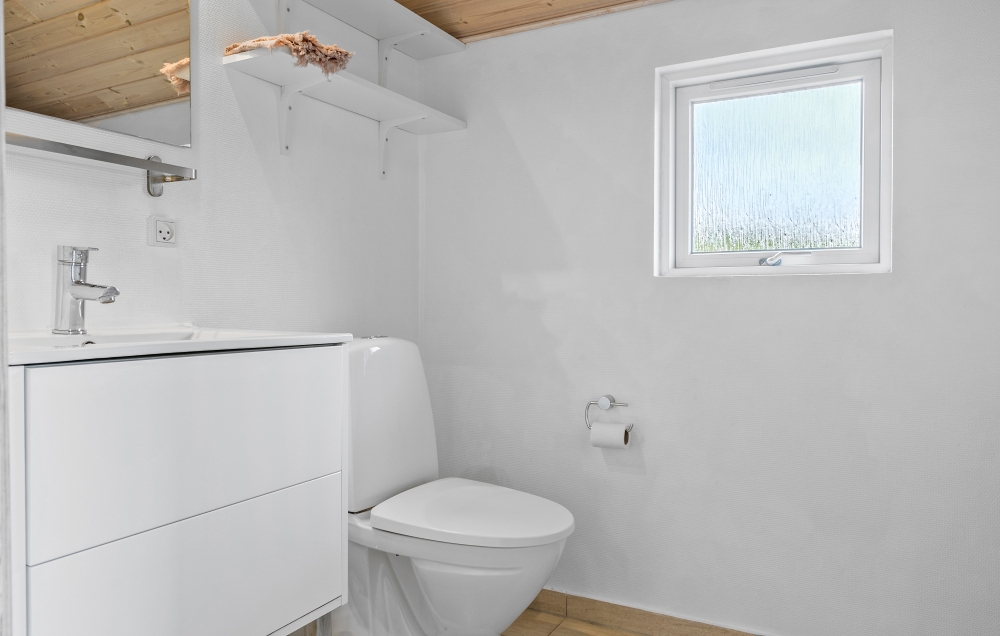 Eines der Badezimmer im Luxusferienhaus Nr. 264