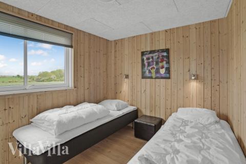 Eines der 5 Schlafzimmer im Luxusferienhaus Nr. 271