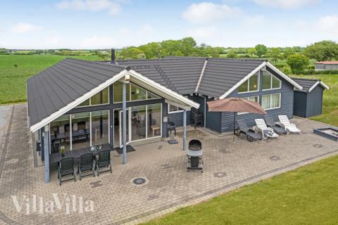 Dieses schöne Poolhaus Nr. 271 mit Platz für 14 Personen liegt in Südjütland