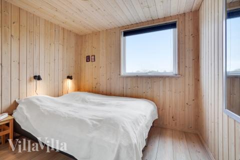 Eines der 7 Schlafzimmer im Luxusferienhaus Nr. 234