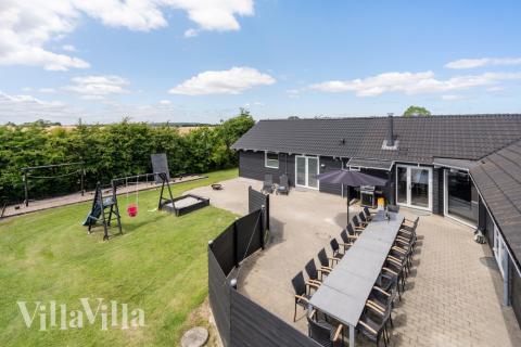 Genießen Sie einen Grillabend auf der Terrasse des Luxusferienhauses Nr. 246 in Südjütland