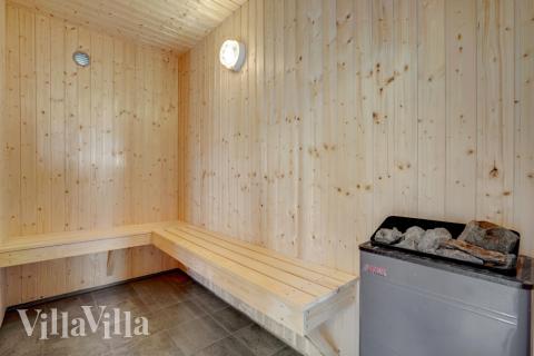Genießen Sie die heiße Sauna im Luxusferienhaus Nr. 246 für 16 Personen