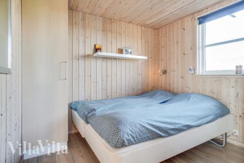 Eines der 6 Schlafzimmer im Luxusferienhaus Nr. 241