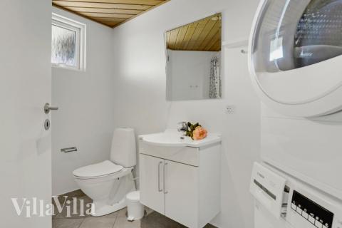 Eines der Badezimmer im Luxusferienhaus Nr. 241