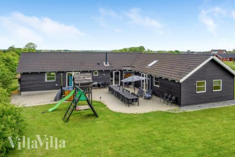 Dieses schöne Poolhaus Nr. 241 mit Platz für 16 Personen liegt in Südjütland