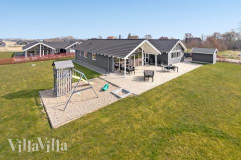 Dieses schöne Poolhaus Nr. 260 mit Platz für 16 Personen liegt in Südjütland