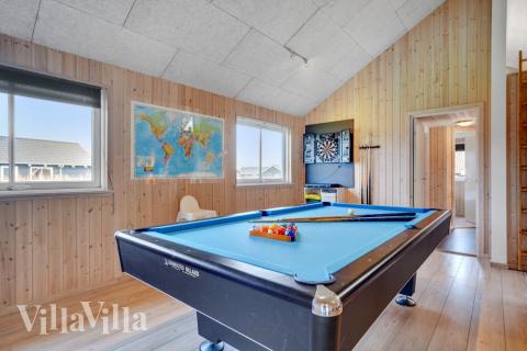 Neben den vielen schönen Stunden, die man im Poolbereich des Hauses verbringen kann, bietet das Luxusferienhaus 260 auch Spielevergnügen bei Billard/Tischtennis und Darts