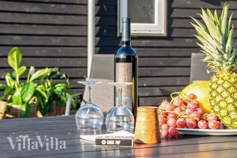 Genießen Sie einen Grillabend auf der Terrasse des Luxusferienhauses Nr. 237 in Südjütland