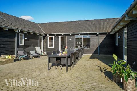 Das Luxusferienhaus Nr. 237 hat eine tolle Terrasse, die mit hochwertigen Gartenmöbeln für 20 Personen ausgestattet ist.