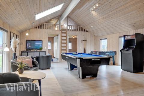 Das Luxusferienhaus 262 für 14 Personen hat einen großen Aktivitätsraum mit u. a. Billard und Darts
