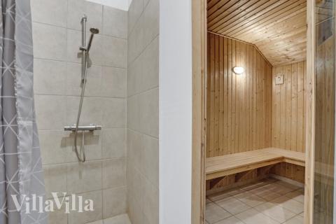 Genießen Sie die heiße Sauna im Luxusferienhaus Nr. 262 für 14 Personen