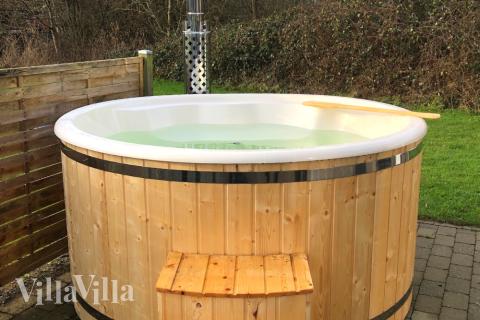 Zu dem attraktiven Ferienhaus Nr. 255 in Südjütland gehört auch ein tolles Angebot im Außenbereich, z. B. Spieleturm und Schaukeln