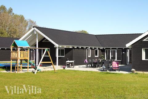 Dieses schöne Sommerhaus voller Aktivitäten garantiert tolle Ferien für alle – egal zu welcher Jahreszeit und zu welchem Wetter