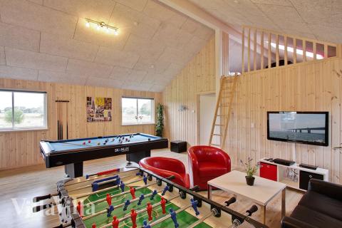 Im Aktivitätenraum können Sie sich gegenseitig in Billard/Tischtennis, Kicker und Dart herausfordern