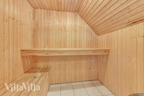 Genießen Sie die heiße Sauna im Luxusferienhaus Nr. 145 für 22 Personen