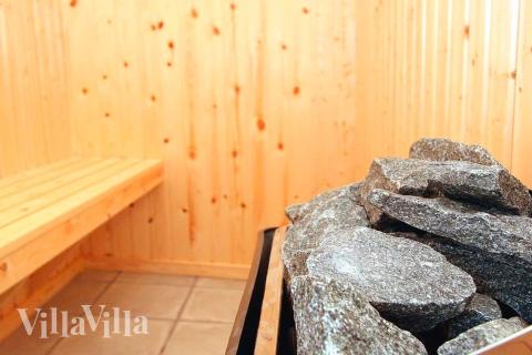 Genießen Sie die heiße Sauna im Luxusferienhaus Nr. 168 für 24 Personen