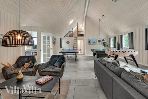 In diesem Ferienhaus wird sich so schnell keiner langweilen. Treten Sie gegen Freunde und Familie in Billard, Kicker, Airhockey, Tischtennis, Dart oder Playstation 2 an