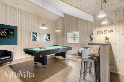 Neben den vielen schönen Stunden, die man im Poolbereich des Hauses verbringen kann, bietet das Luxusferienhaus 197 auch Spielevergnügen bei Billard/Tischtennis und Darts