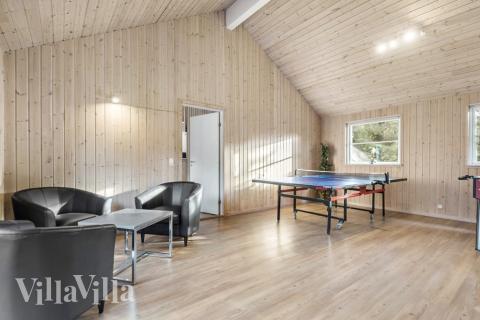 Aktivitätsraum im Luxusferienhaus Nr. 197 mit 9 Schlafzimmern und Platz für 22 Gäste.