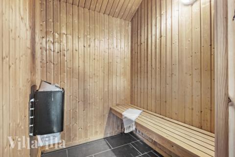 Genießen Sie die heiße Sauna im Luxusferienhaus Nr. 197 für 22 Personen