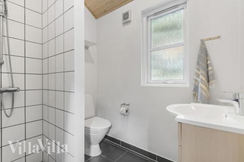 Eines der Badezimmer im Luxusferienhaus Nr. 197